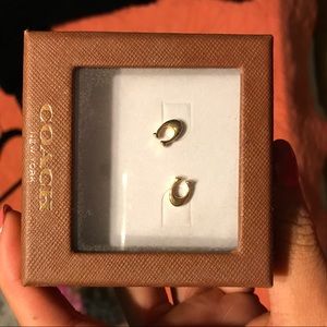 Never worn coach studded earrings !!!!
